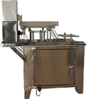 Capsule filling and sealing machine
